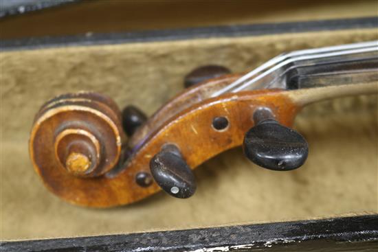 A mandolin and a cased violin